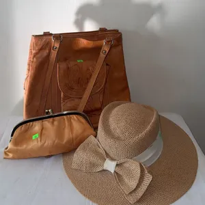 Accessories Including Tooled Leather Purse, Straw Hat With Bow, Satin Clutch, and Costume Jewellery