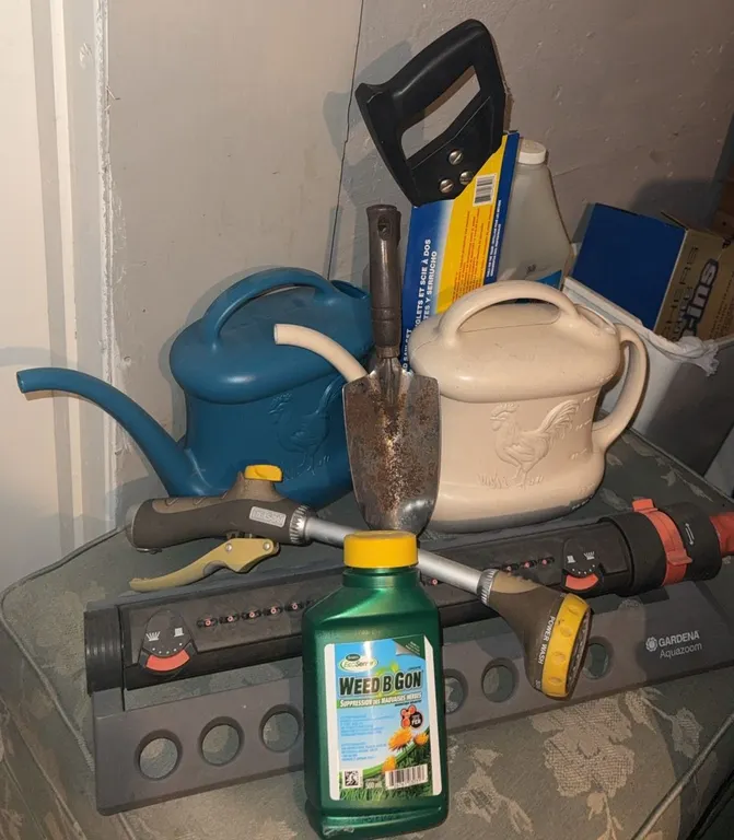 Garden Tool Lot with Watering Cans, Trowel, Hose Nozzle and Weed Control