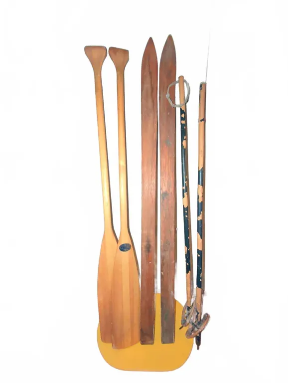 2 Wooden Canoe Paddles, 2 Wooden Skis And 2 Ski Poles