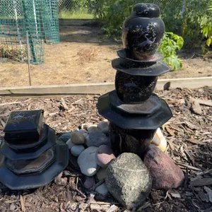 Stacked Black Lacquer Ornamental Garden Sculpture With Crane Motif