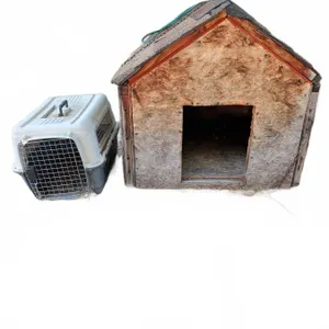 Large Wood Dog House With Shingle Roof and Plastic Pet Carrier