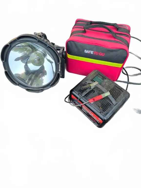 Cyclops Spotlight, MotoMaster Charger, and Safe To Go Emergency Kit