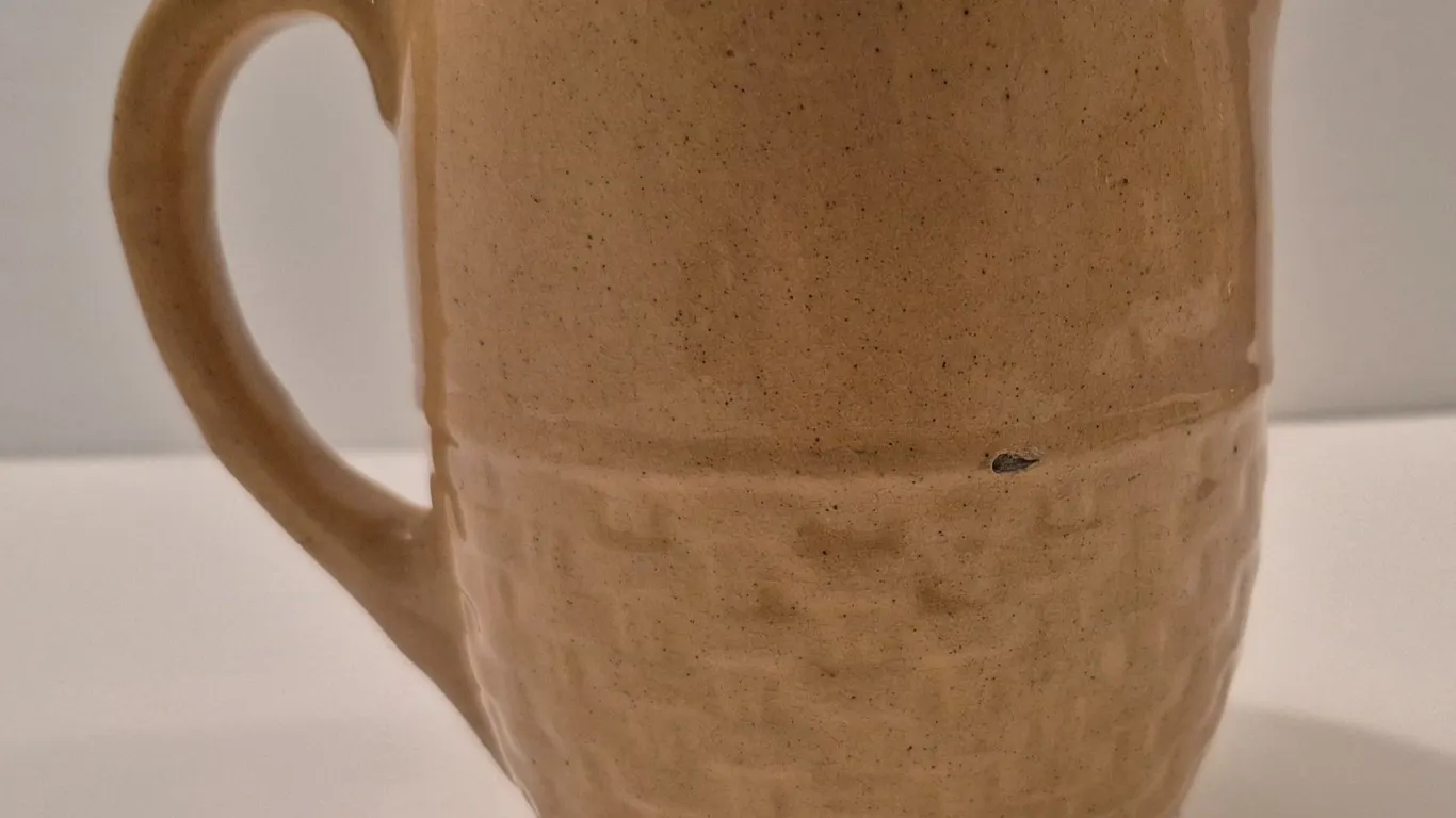 Medalta pitcher, 5 inches tall, couple small flaws in the making