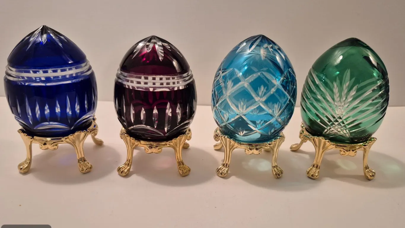 Group of 4 Bohemian cut glass eggs on 24k gold-plated stands