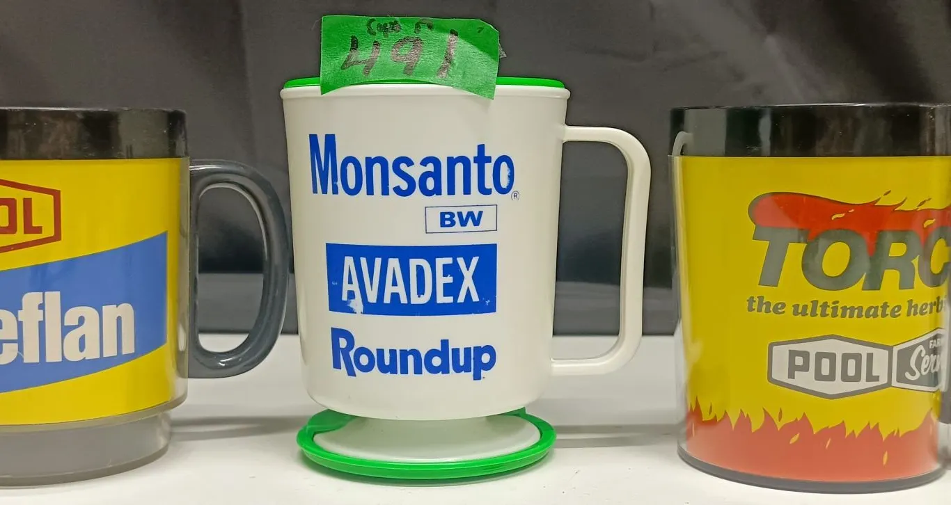 3 Mugs With Herbicide Logos