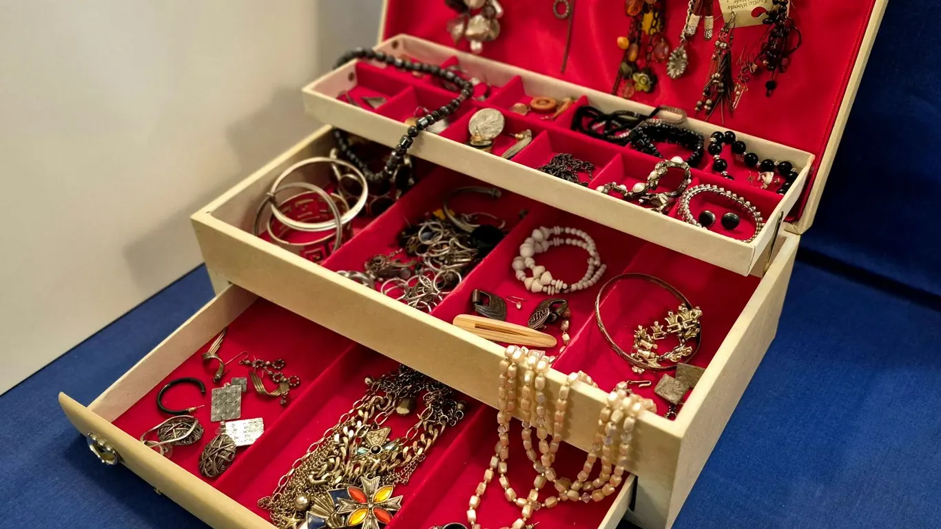 Large vintage jewelry box with contents, mostly heavy glass jewelry