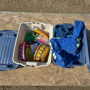 (2) Storage Totes w/ Easter Décor, Work Wear, etc.