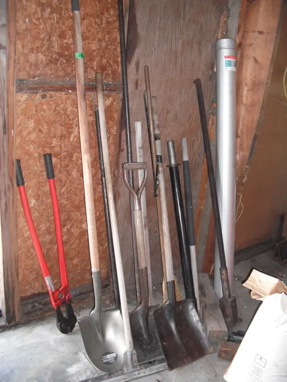 assorted hand tools - bolt cutters, HD pry bars, shovels, etc.