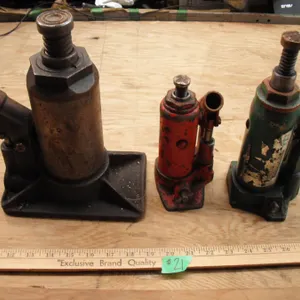 3 vintage bottle jacks