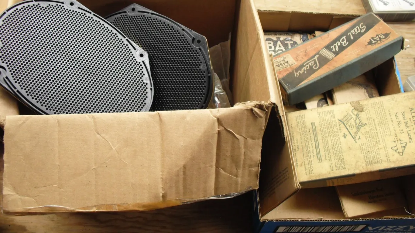 lot of belt lacing & pair of speakers
