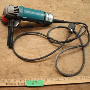 Makita 100m disc grinder - working, cord repaired