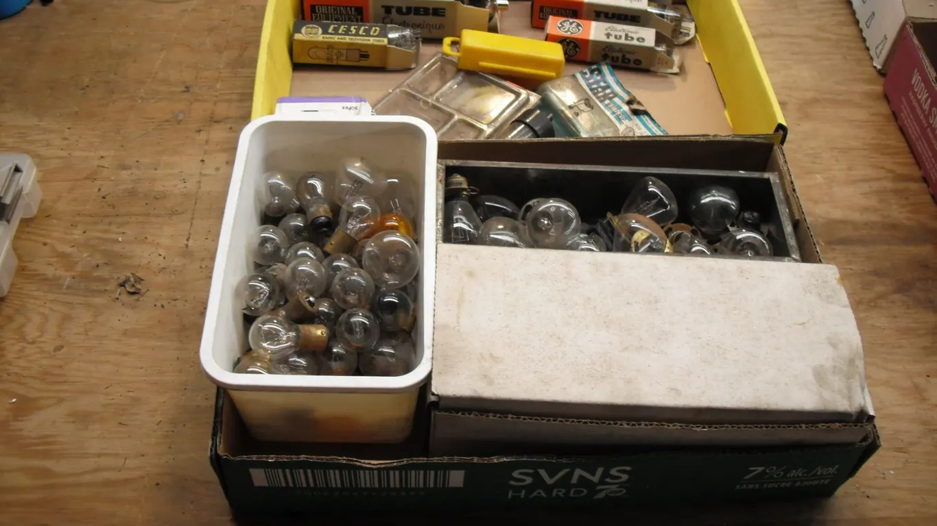 vintage automotive bulbs, tire repair tools, etc.