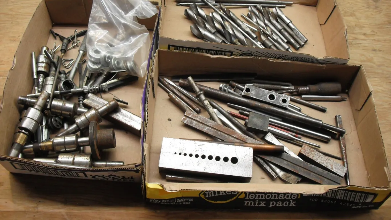 lot of large drill bits & rollers