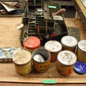 tackle box w/ misc. & assorted tins