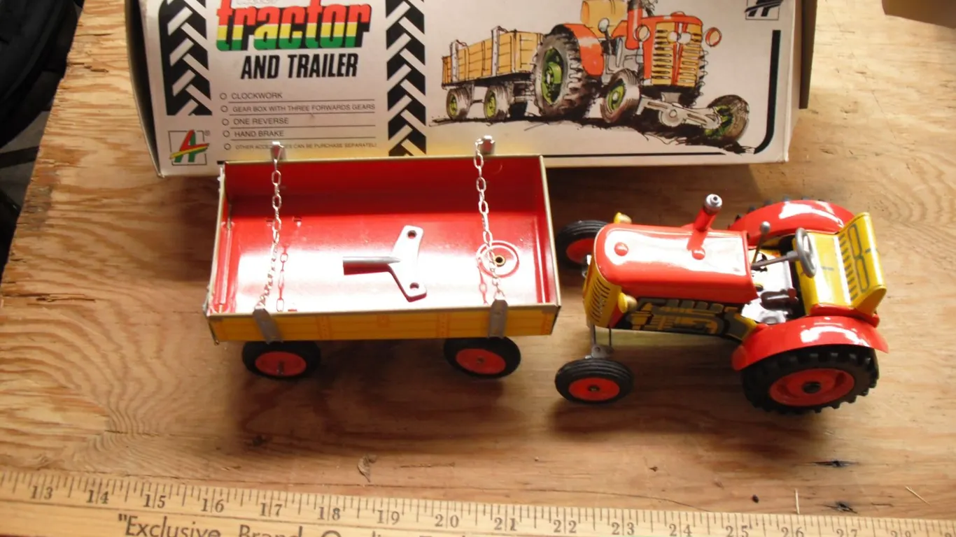 Kovap tin windup tractor and trailer in original box