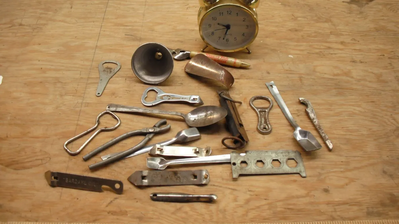 vintage bottle opoeners, funnel, etc.