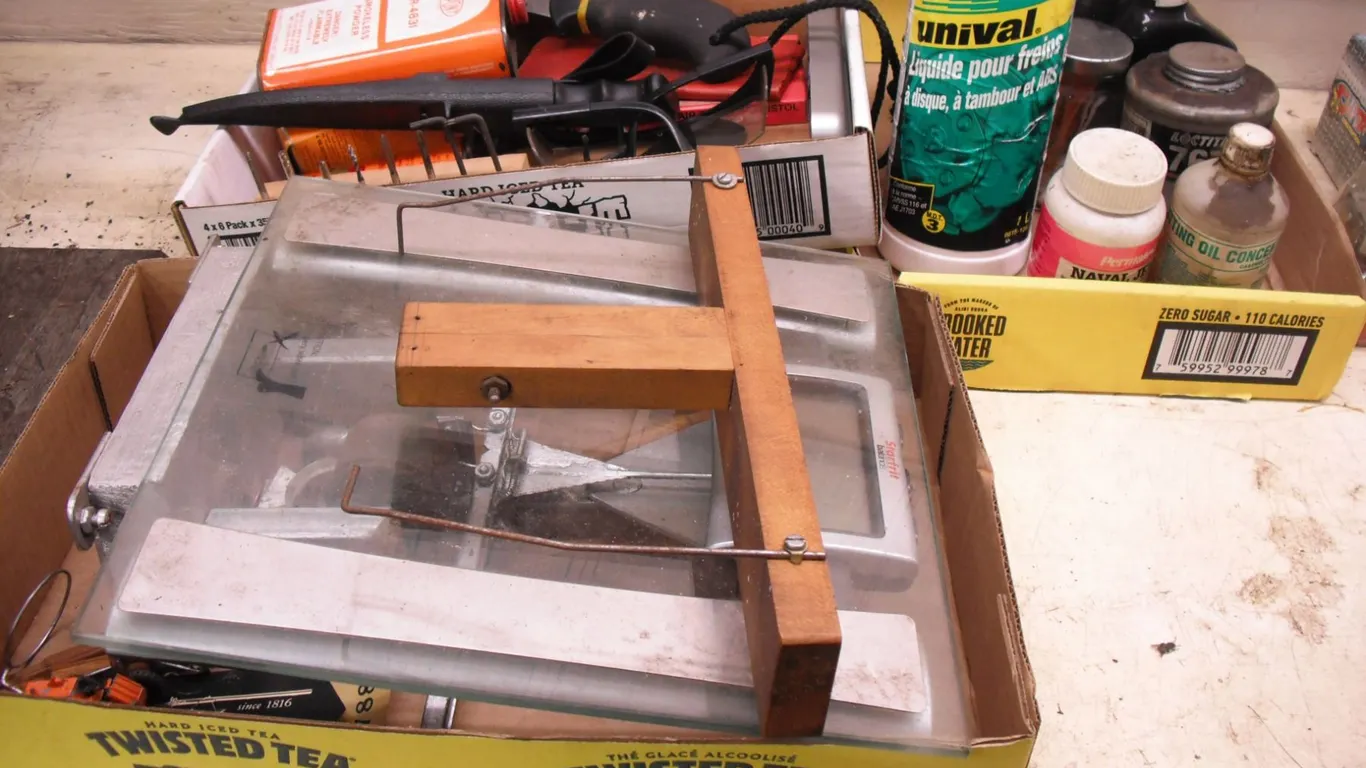 assorted lot - saw, filet knife, cutting oil, etc.
