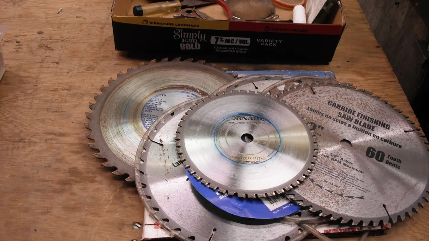 circular saw blades (mostly 10", 1x 7"), pliers, punch, etc.