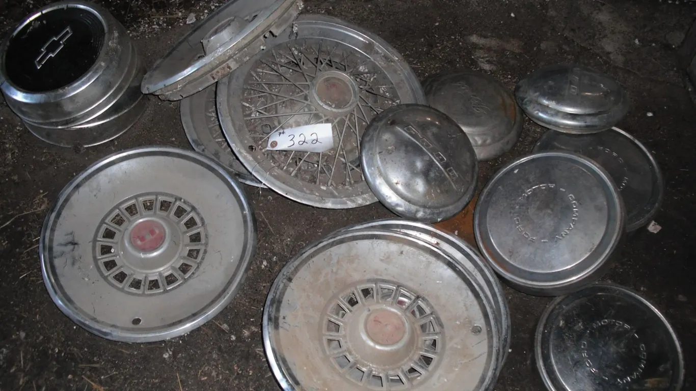 lot of hubcaps - ford, chevrolet