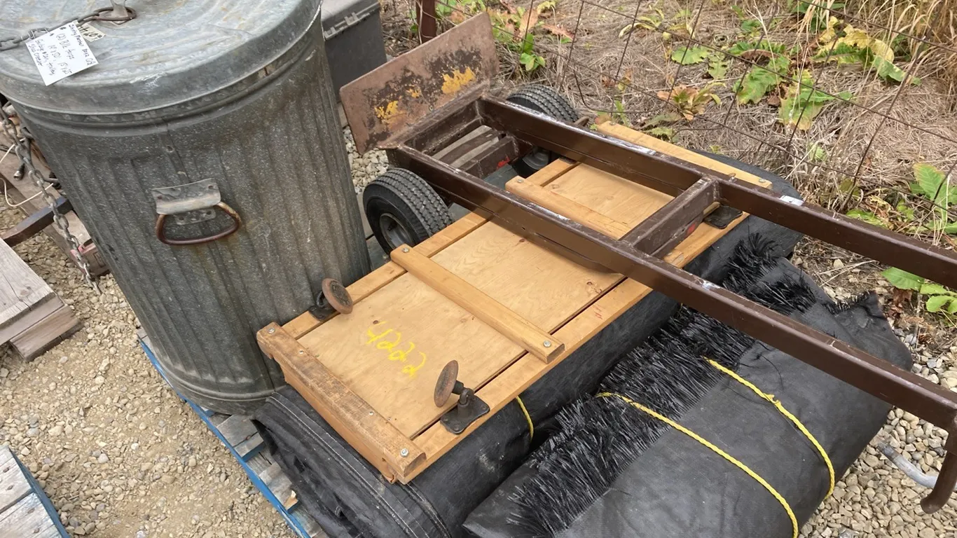 (2) Black Tarps, Garbage Can, Trolley and a Shop Creeper