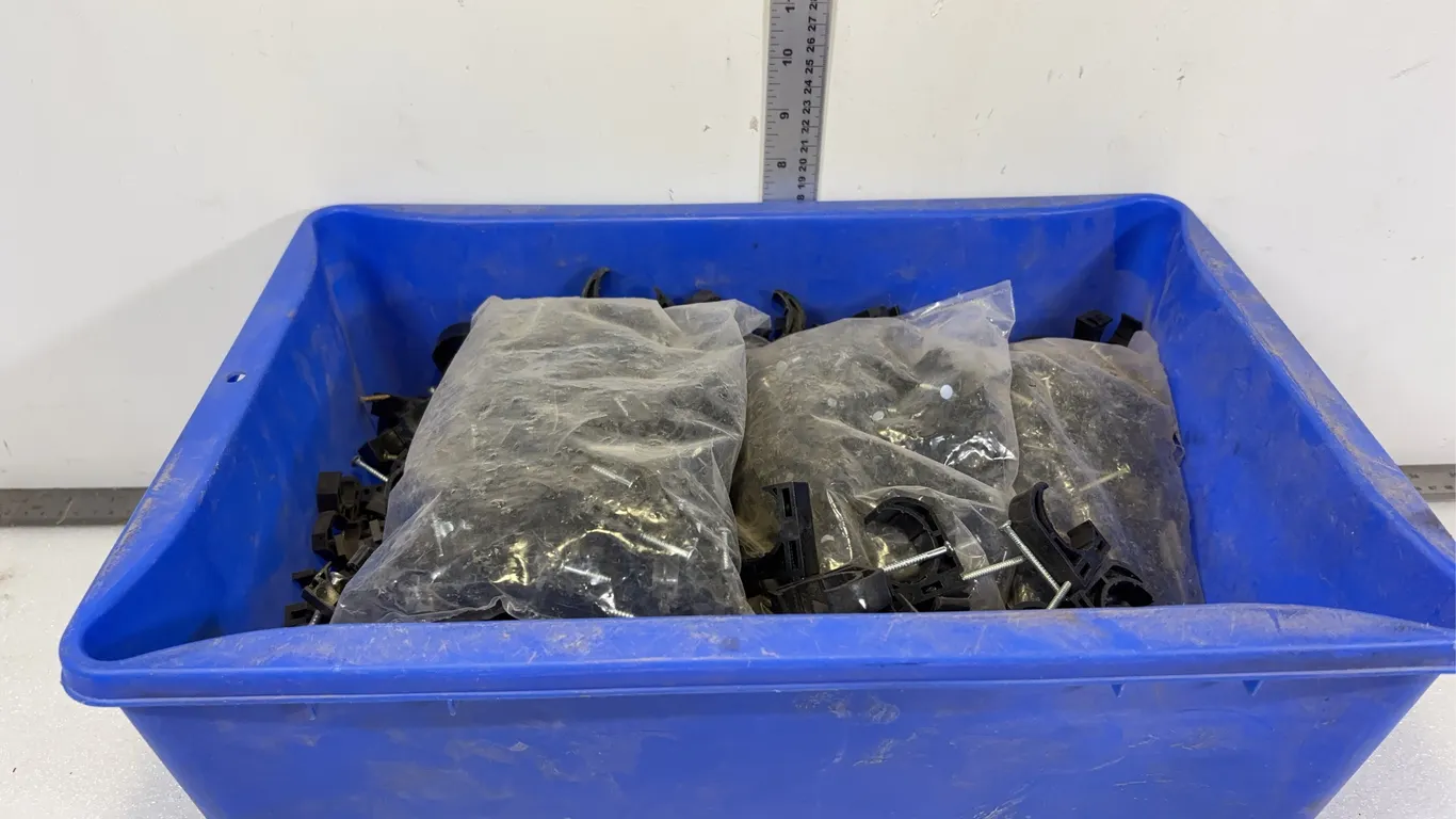 1 - Bin of Plastic J Clamps with Integrated Mounting Nail, approx. 80 Pieces *Unreserved*