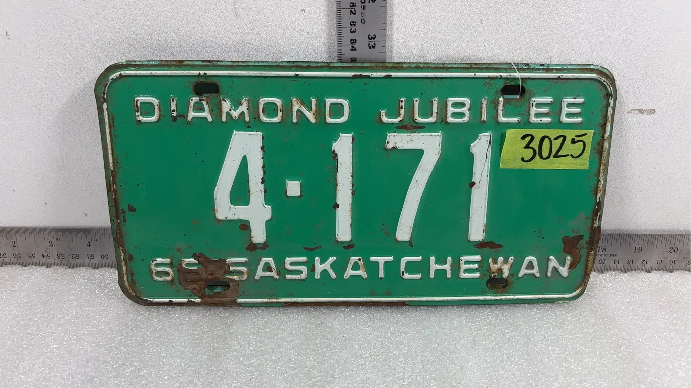 1 - Vintage 1965 Saskatchewan License Plate, 1 - Vintage 1960 BC License Plate, Approx 12"x6", *Unreserved*