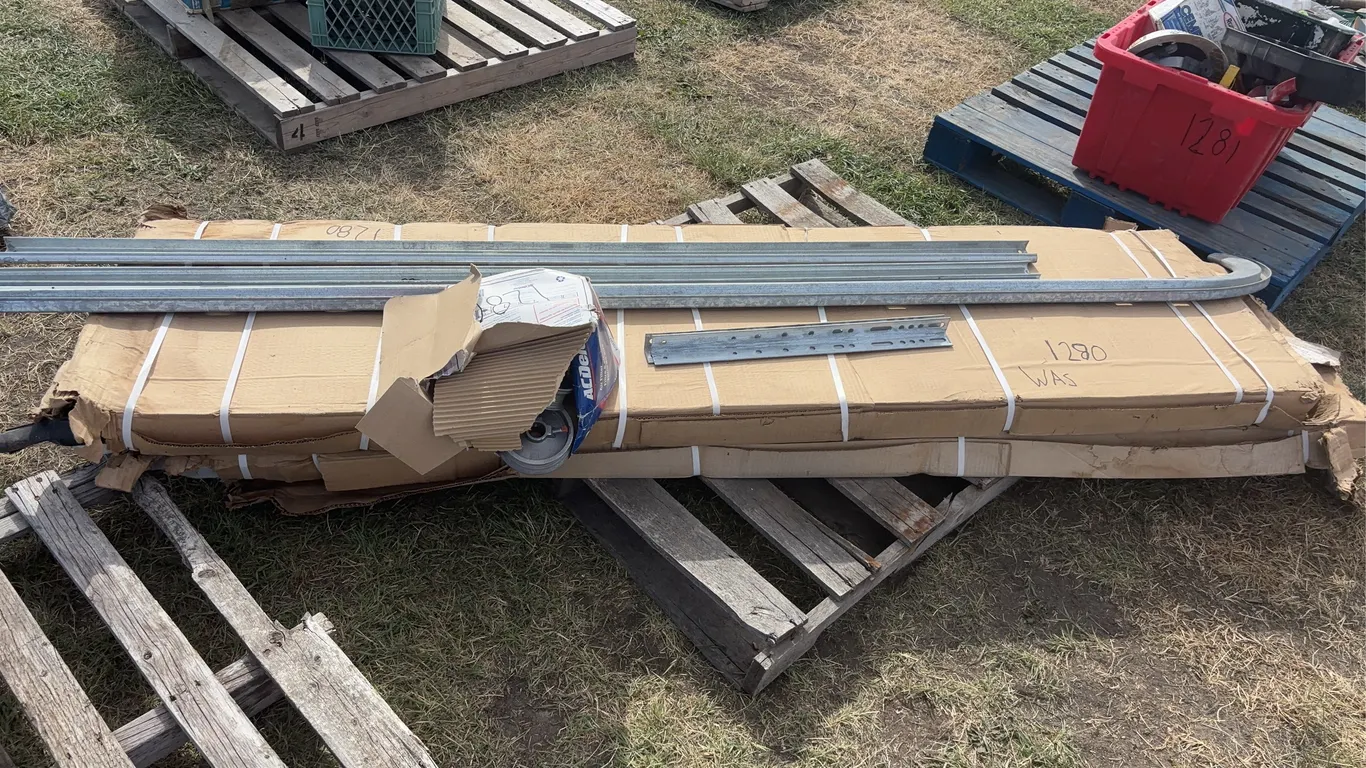 Insulated Garage door w/ rails, screws, brackets, approx 7'x7', *Unreserved*