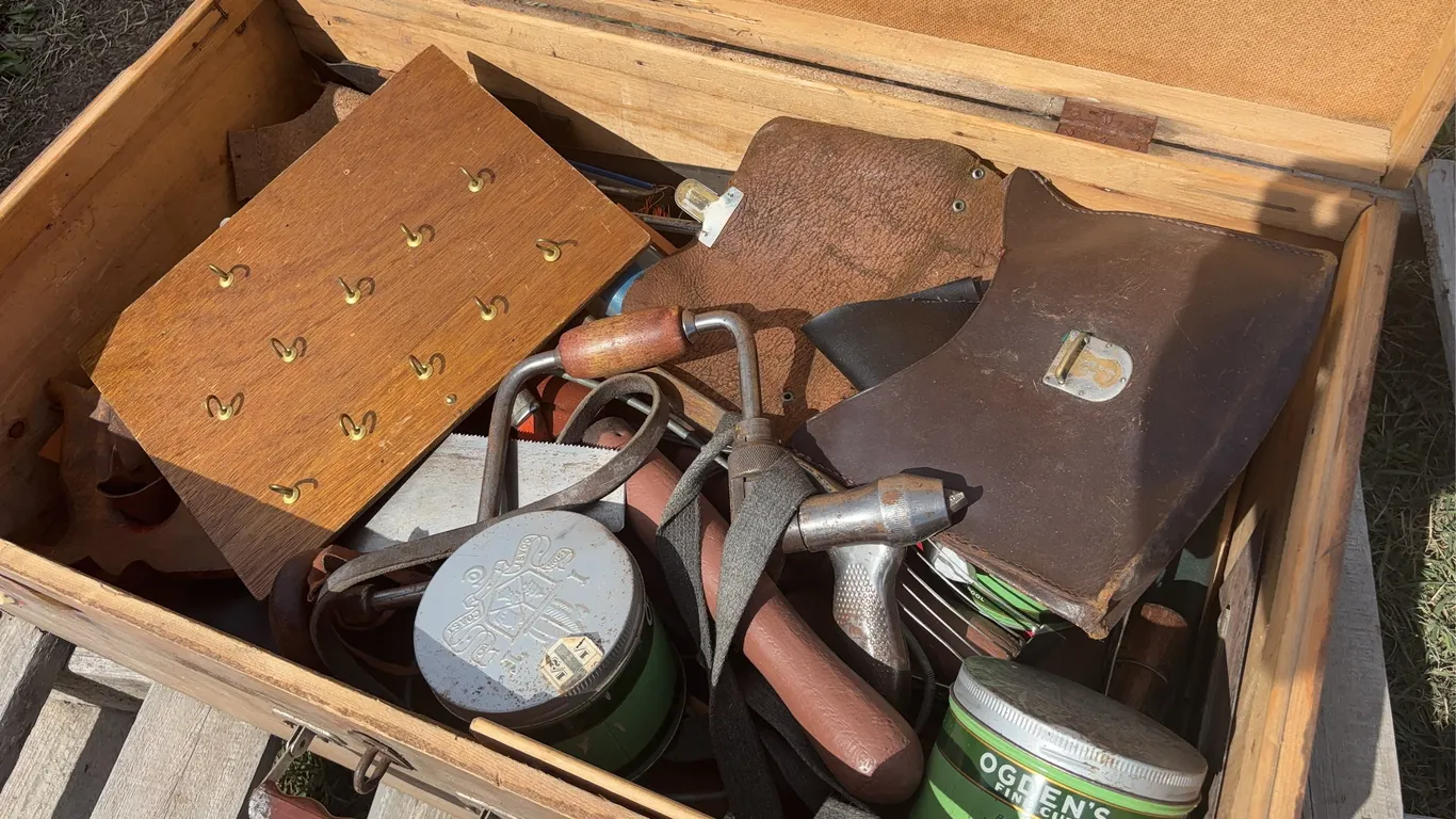 Crate of vintage tools, saws, handheld drills, crescent wrenches, *Unreserved*