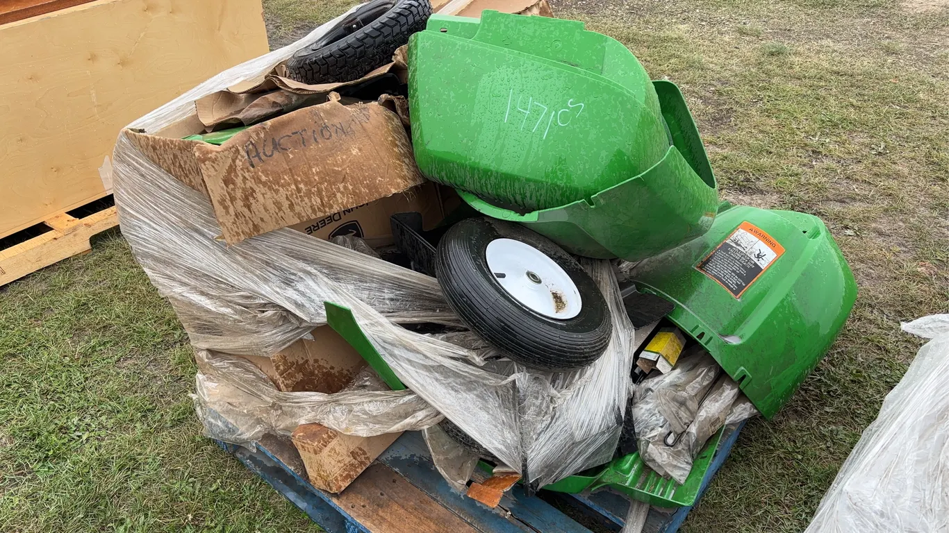 Assorted lawn mower body pieces & wheels, *Unreserved*
