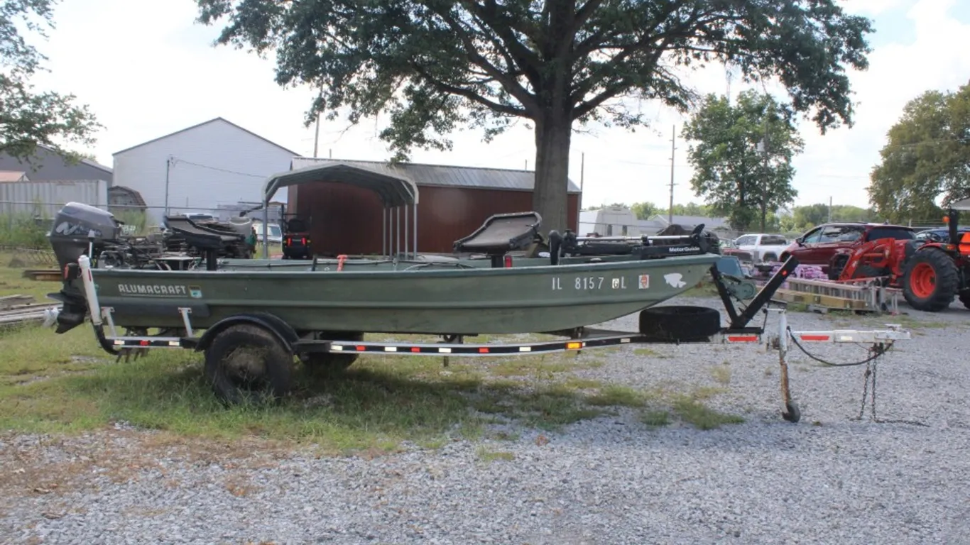 15 Foot Alumacraft Flat Bottom John Boat. with a Nissan 4-Stroke Outboard Motor