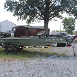 15 Foot Alumacraft Flat Bottom John Boat. with a Nissan 4-Stroke Outboard Motor