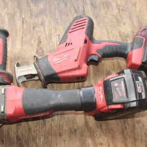 Milwaukee M18 Reciprocating Saw and Grinder Comes with 2 Batteries, No Charger