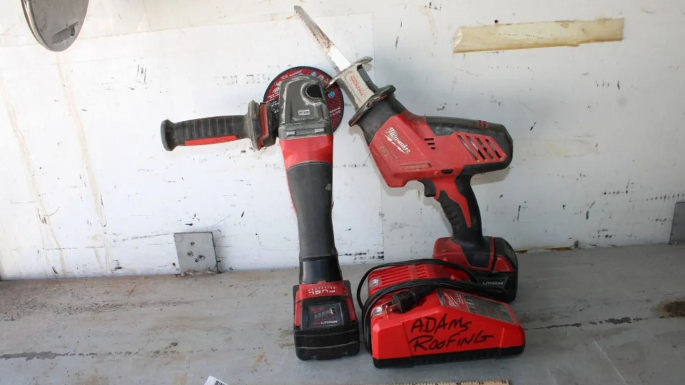 Milwaukee M18 Reciprocating Saw, Angle Grinder, 2 Batteries, and an M18 M12 Charger