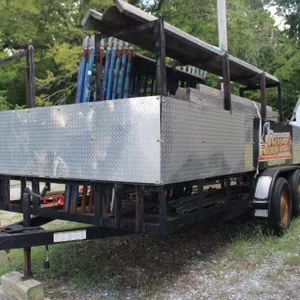 Dual Axle Utility Trailer Drop Ramp Fitted with Racks. Was Used for Scaffolding Hauling
