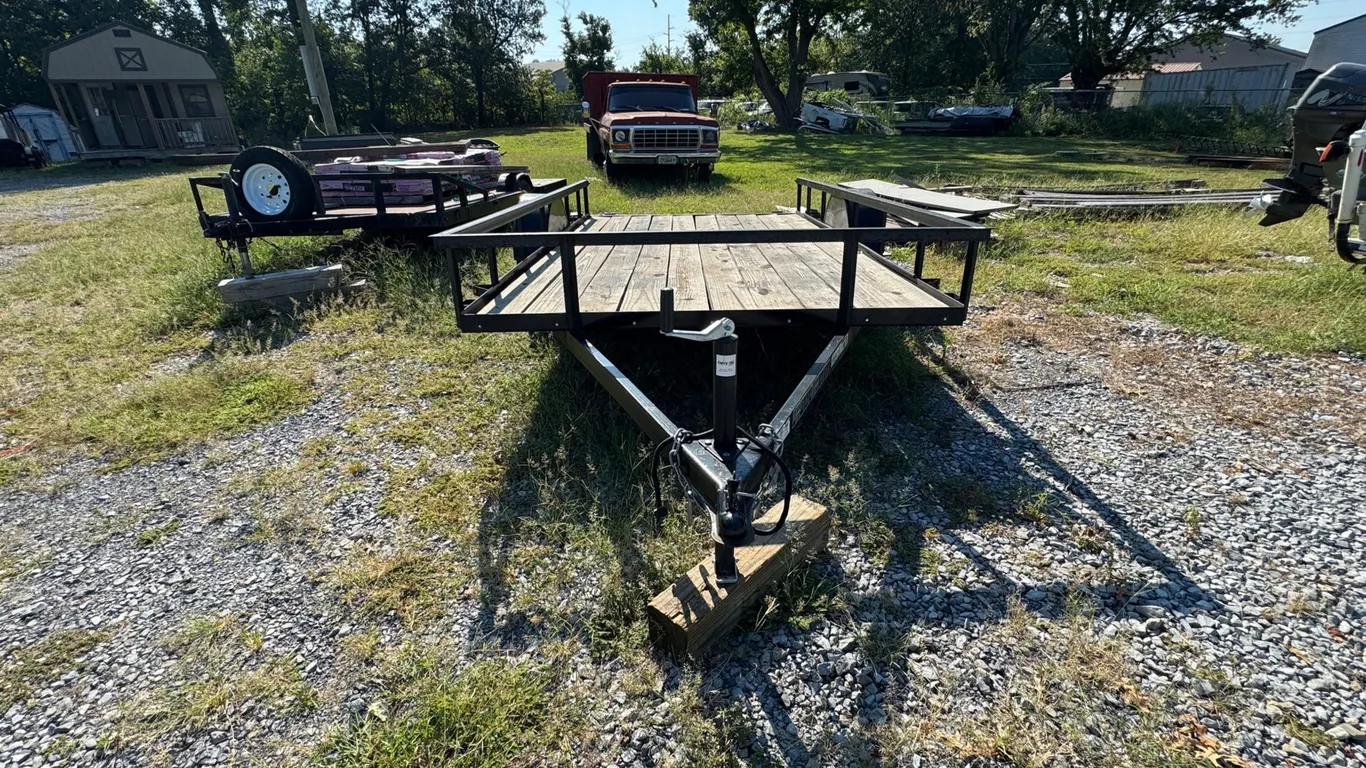 Carry On Brand Utility Trailer with Ramp. Significant Bending on Ramp. Wood Floor