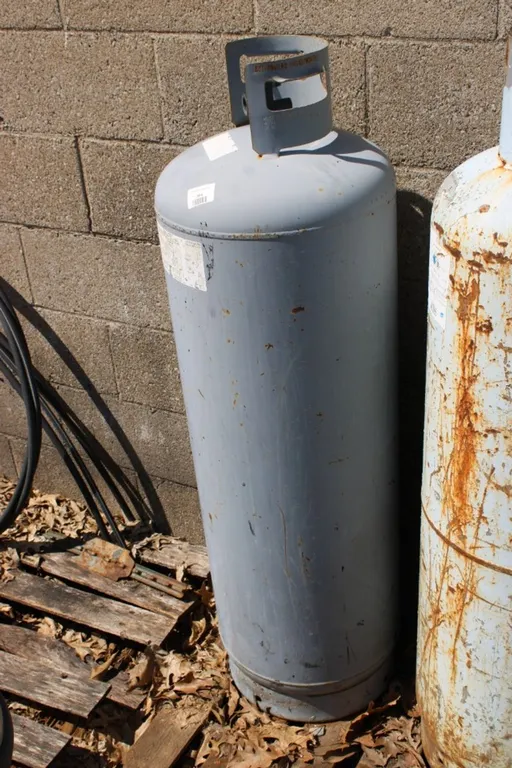 Propane Tank Stamped 67.7 Pounds