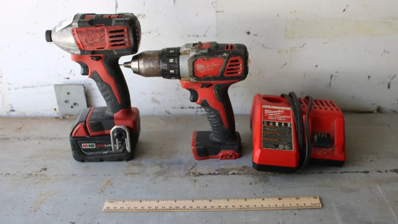 Milwaukee M18 Impact and Drill with 1 Battery and an M18 M12 Charger