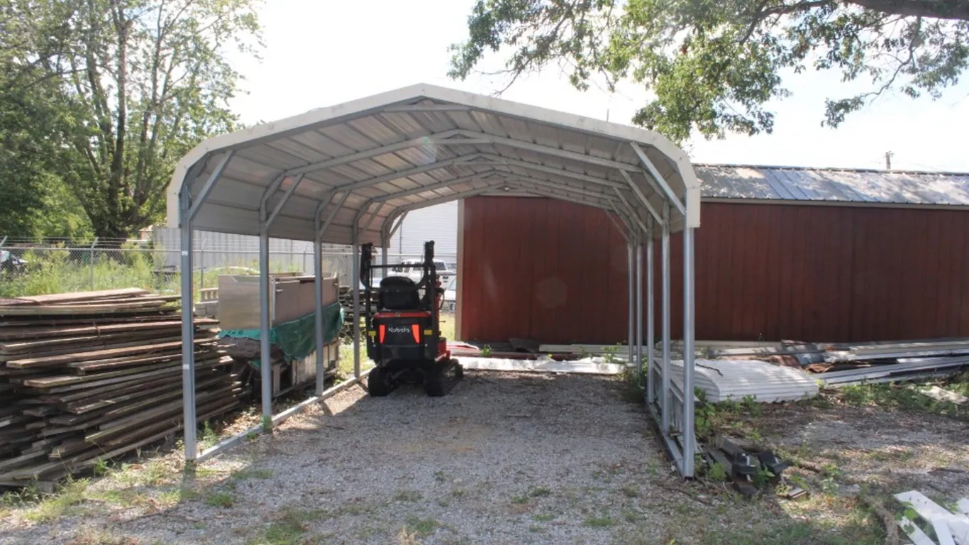 20 by 12 Carport, 9 Foot to the Center Peak. One Upright Has a Dent