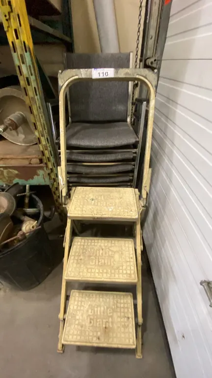 STACK OF GREY PADDED OFFICE CHAIRS & LITTLE GIANT PORTABLE STEP STOOL