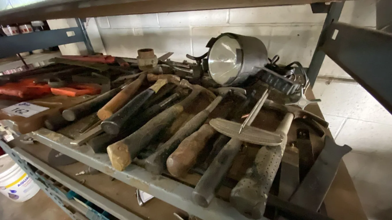SHELF OF ASSORTED HAND TOOLS
