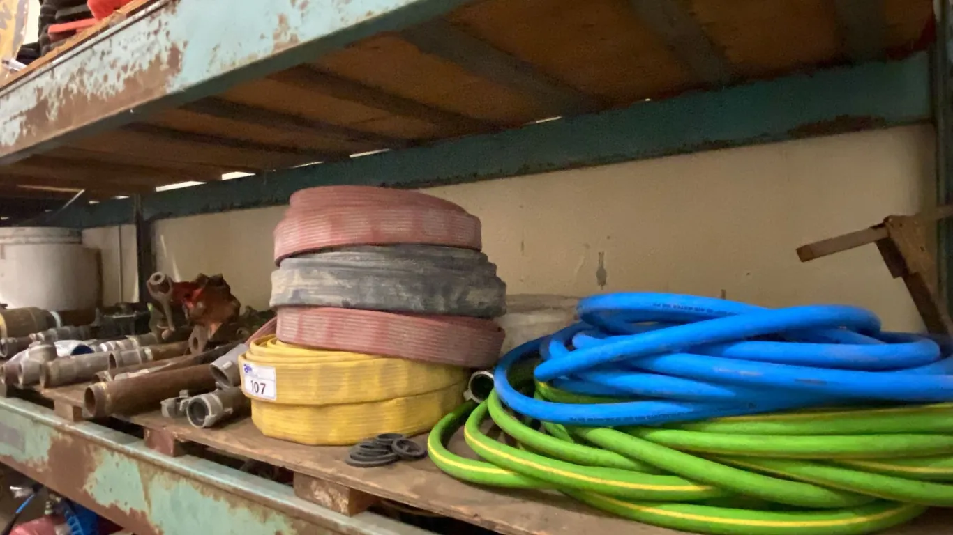 SHELF OF ASSORTED WATERMAIN TESTING EQUIPMENT- WATER HOSE, FIREHOSE, COUPLINGS, SHUT OFF VALVES,