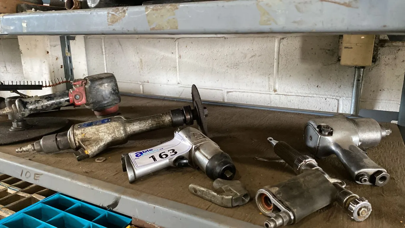 SHELF OF ASSORTED PNEUMATIC TOOLS