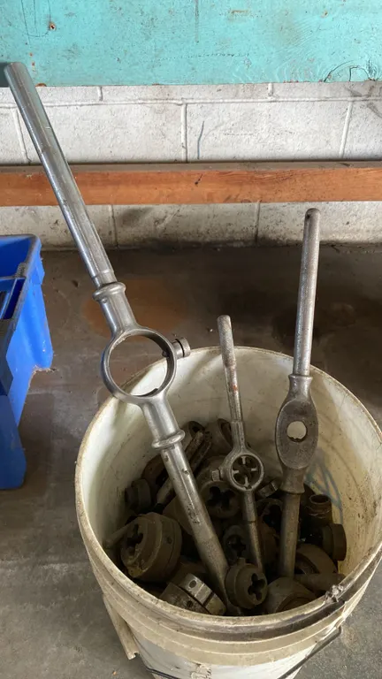 PAIL OF ASSORTED HEAVY DUTY TAPS AND DIES