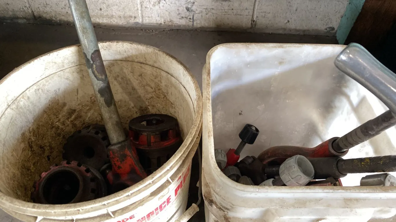 2 BUCKETS OF RIDGID PIPE THREADING TOOLS