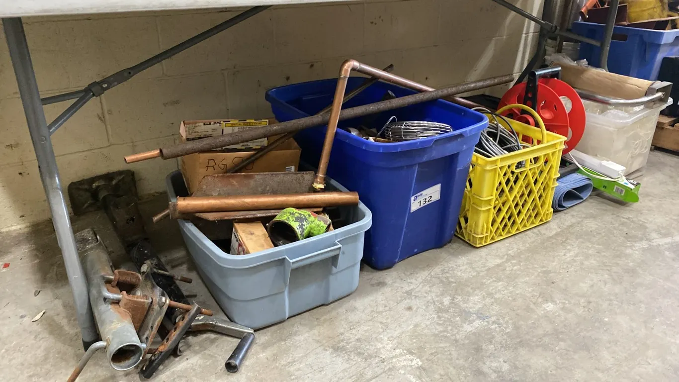 LARGE GROUP OF ASSORTED ITEMS- HOSE REEL, COPPER PIPES, TRAILER JACK, PLUMBING PARTS, CONCRETE MIX