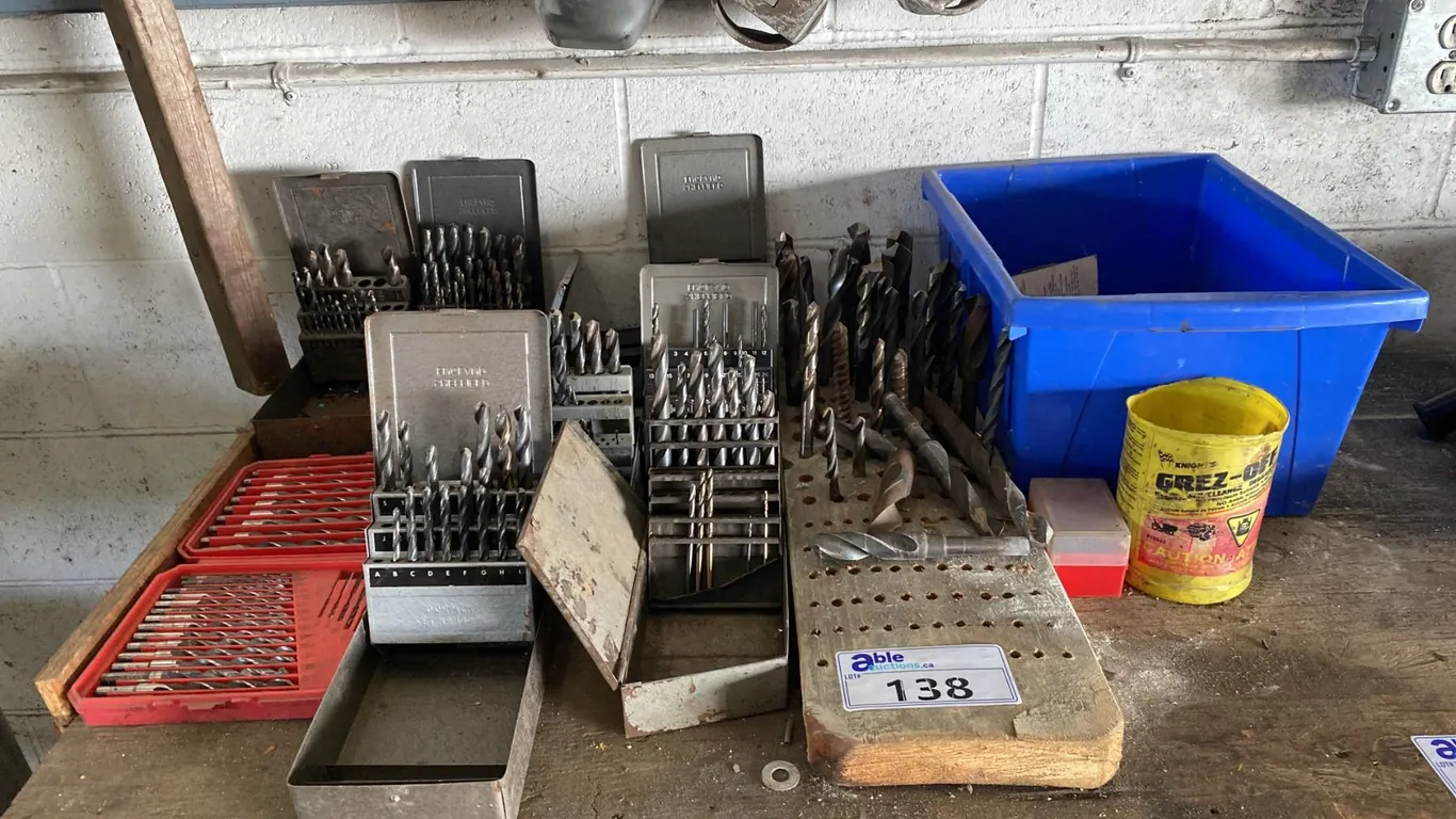 LARGE GROUP OF ASSORTED DRILL BITS & CASES