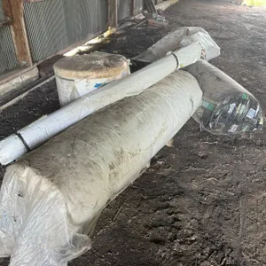 (3) Bundles of Insulation and (1) Tarp Roll