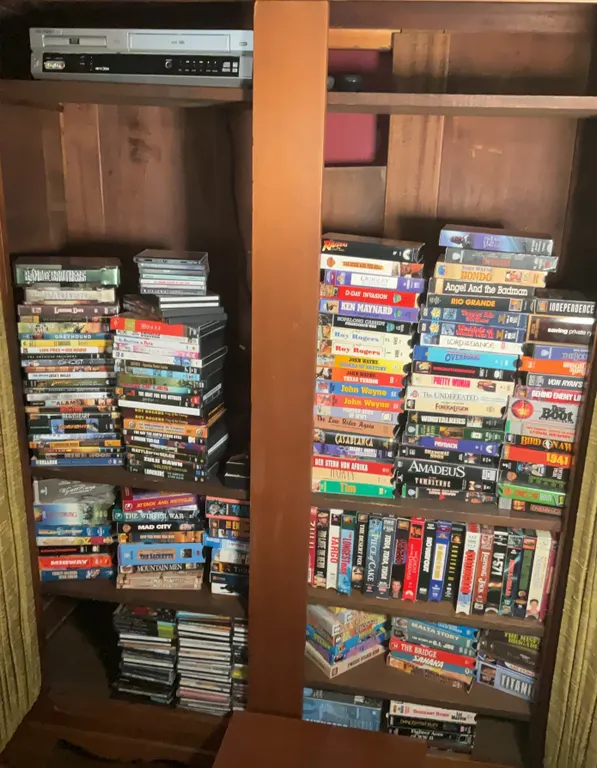 Variety of VHS Tapes, DVD’s, CD’s & Go.Video VHS Player