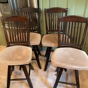 4 Swivel Counter Stools with Cushion Seats.