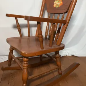 Vintage Child’s Spindle Back Rocking Chair Featuring Distinctive Floral Decal
